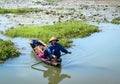 People rowing boat on the lotus lake