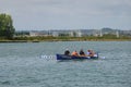 People rowing a racing pilot gig