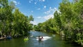 People rube the Boise River with a jet boat