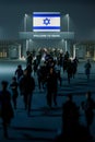 People run away through the border checkpoint gate out of ISRAEL at night - 3D rendered