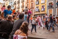 People running with bull on Plaza Mayor in Cuenca