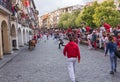 People running from the bulls during the Bull Runs festivities Navarre, Spain.