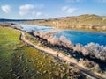 People running at country road near river aerial landscape Royalty Free Stock Photo