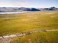 People running at country road near river aerial landscape Royalty Free Stock Photo