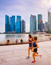 People running at promenade Singapore Royalty Free Stock Photo