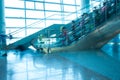 People rush on escalator motion blurred Royalty Free Stock Photo