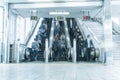 People rush on a escalator motion blurred Royalty Free Stock Photo