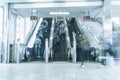 People rush on a escalator motion blurred Royalty Free Stock Photo