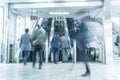 People rush on a escalator motion blurred Royalty Free Stock Photo