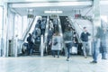 People rush on a escalator motion blurred Royalty Free Stock Photo