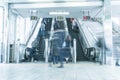 People rush on a escalator motion blurred Royalty Free Stock Photo