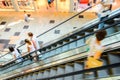 People rush on escalator motion blurred Royalty Free Stock Photo