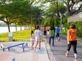 People ruuning at park in evening Royalty Free Stock Photo