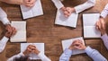 People`s Praying Hands On Holy Bible Royalty Free Stock Photo