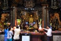 Asian people lighting candles in Buddhist and Taoist Temple Jade Emperor Pagoda, Ho Chi Minh City, Vietnam. Royalty Free Stock Photo