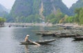 People sailing boats at Tam Coc