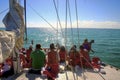 People sailing on deck of a boat