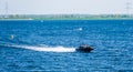 People sailing in a speedboat on the oosterschelde of tholen, Touristic water sport and transportation, popular city in zeeland,