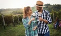 People sampling and tasting wines in vineyard Royalty Free Stock Photo