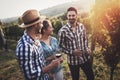 People sampling and tasting wines in vineyard Royalty Free Stock Photo