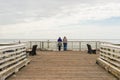 People at San Simeon Pier, California, USA