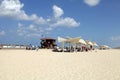 People on the sand beach in Herzliya Pituah, Israel. Royalty Free Stock Photo