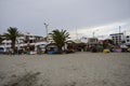 People on a sandy beach in the city of Paracas. Peru