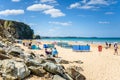 People on a Sandy Beach