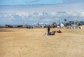 People on sandy beach near North sea in Zandvoort