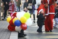 People in Santa Claus costumes take part in the race