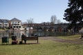 People sat by the Thames at Bridge Gardens in Maidenhead, Berkshire in the UK