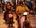 People on scooters in Hanoi