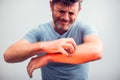 People scratch the itch with hand, Elbow, itching, Healthcare An Royalty Free Stock Photo