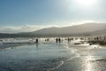 People in the sea near the shore after a storm Royalty Free Stock Photo