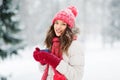 Happy young woman with tea cup in winter park Royalty Free Stock Photo