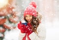 happy young woman with tea cup in winter park Royalty Free Stock Photo