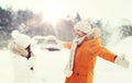 Happy couple playing with snow in winter Royalty Free Stock Photo