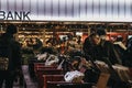 People at second hand book market in Southbank, London, UK, in the evening Royalty Free Stock Photo