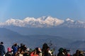 People are seeing the first light of new year`s day at dawn with mountain villages and Kangchenjunga mountain in winter.