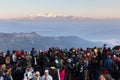 People are seeing the first light of new year`s day at dawn with mountain villages and Kangchenjunga mountain in winter.