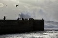 People seeing storm at sea