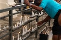 People are seen placing candles at the Campo Santo cemetery on the Day of the Dead holiday in the city of Salvador, Bahia