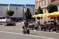 People on Segways at The Town Hall Square in Vilnius, Lithuania.