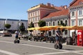 People on Segways at The Town Hall Square in Vilnius, Lithuania.