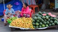 People sell fresh fruits on street in Saigon, Vietnam