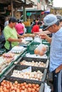 People selling and buying food in a traditional fruit and vegetable market of Taiwan Royalty Free Stock Photo