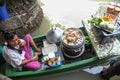 People selling food closeup boat in floating market pattaya