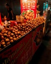 People selling fried octopus in Thailand night market