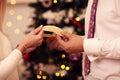 People sharing Christmas wafer in Poland