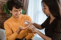 People sharing hand sanitizer to prevent infection